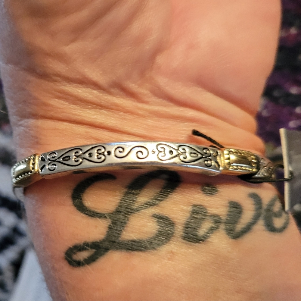 Howards silver and gold tone stretchy bracelet